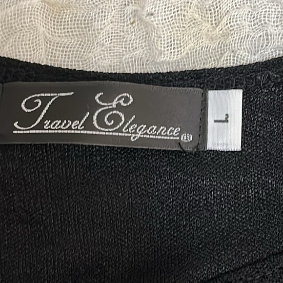 Travel Elegance Long Sleeve Black Top.
Size Large - Picture 14 of 15